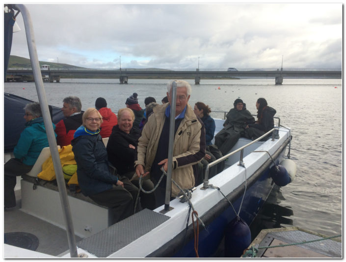 boat full of tourists departing on skellig islands eco tour