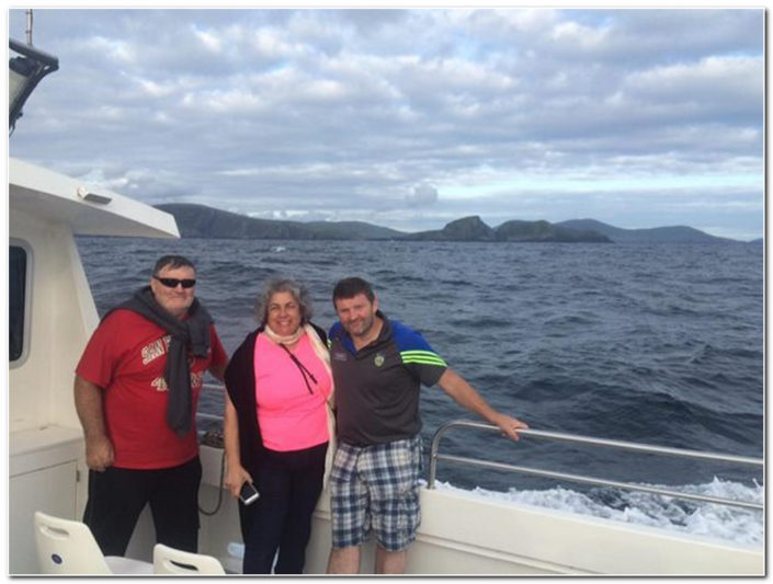 happy customers heading for skellig michael